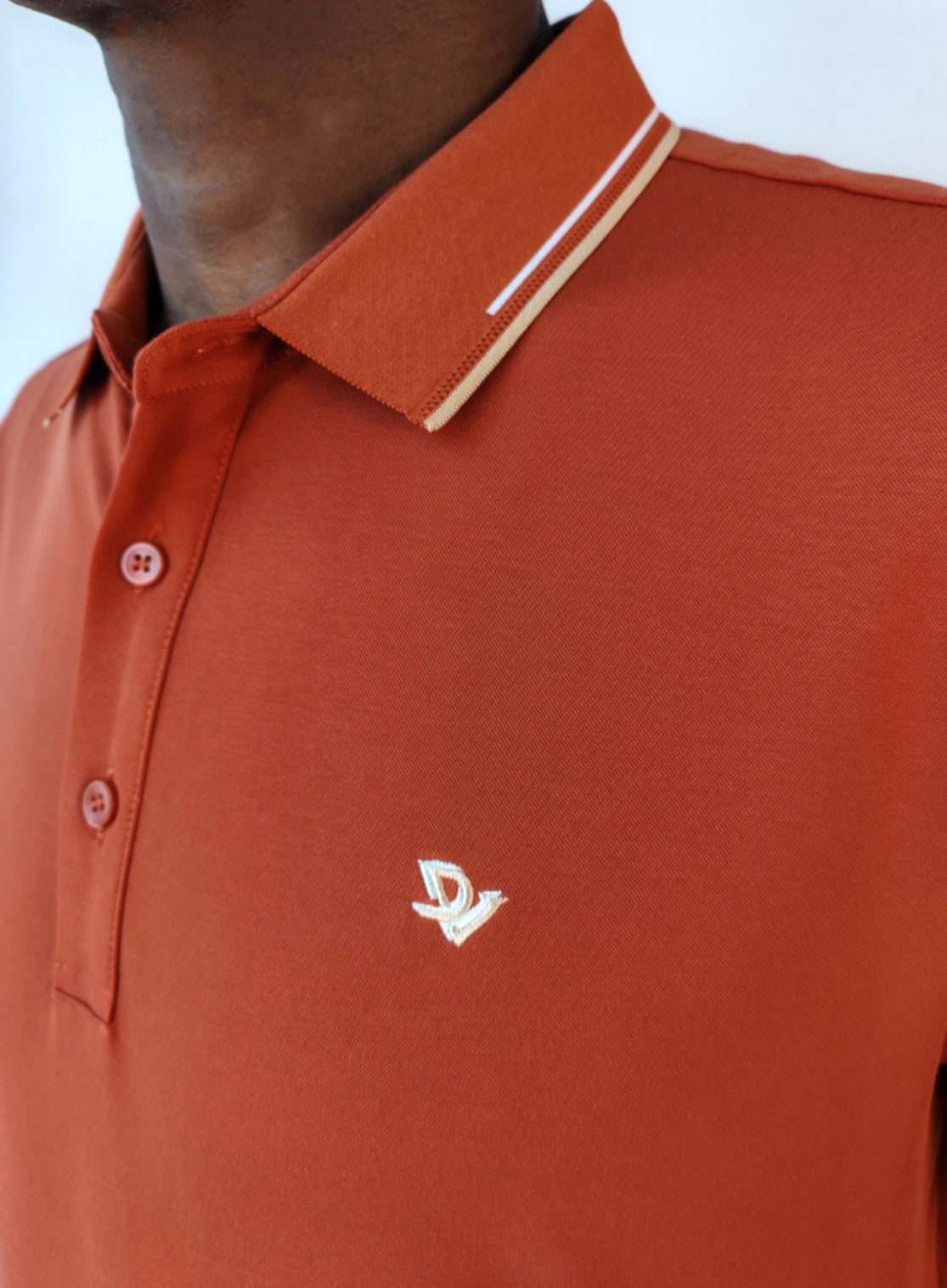 Polo Doble DV color naranja quemado
